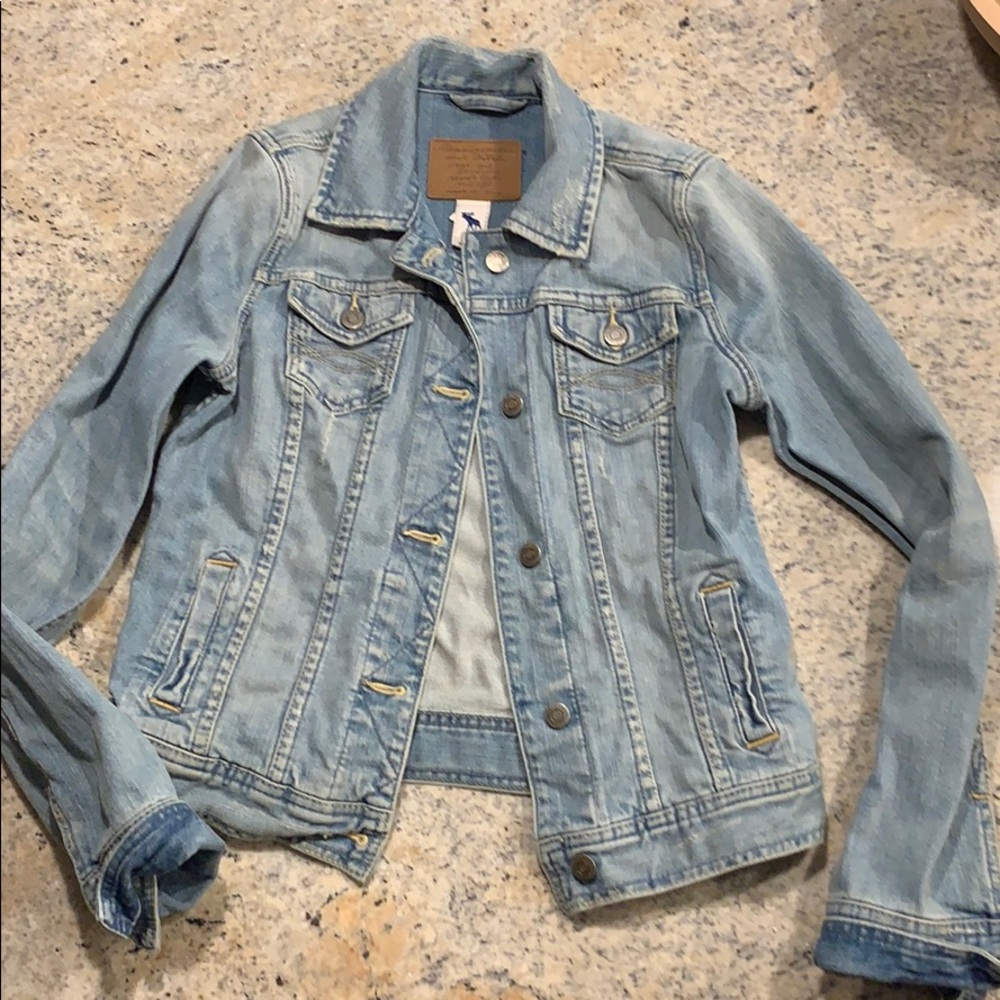 Distressed denim jacket